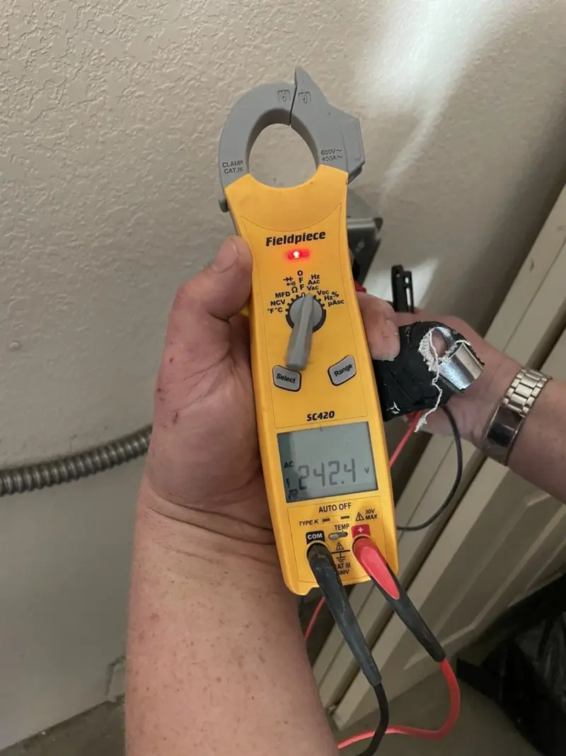 Voltage testing with clamp meter during Generator Installation in Rochelle
